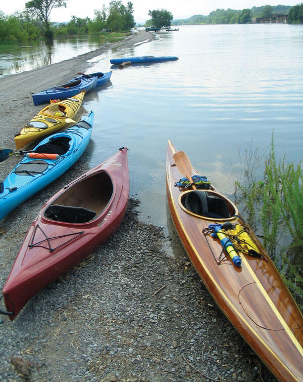 Kayaks around a lake 